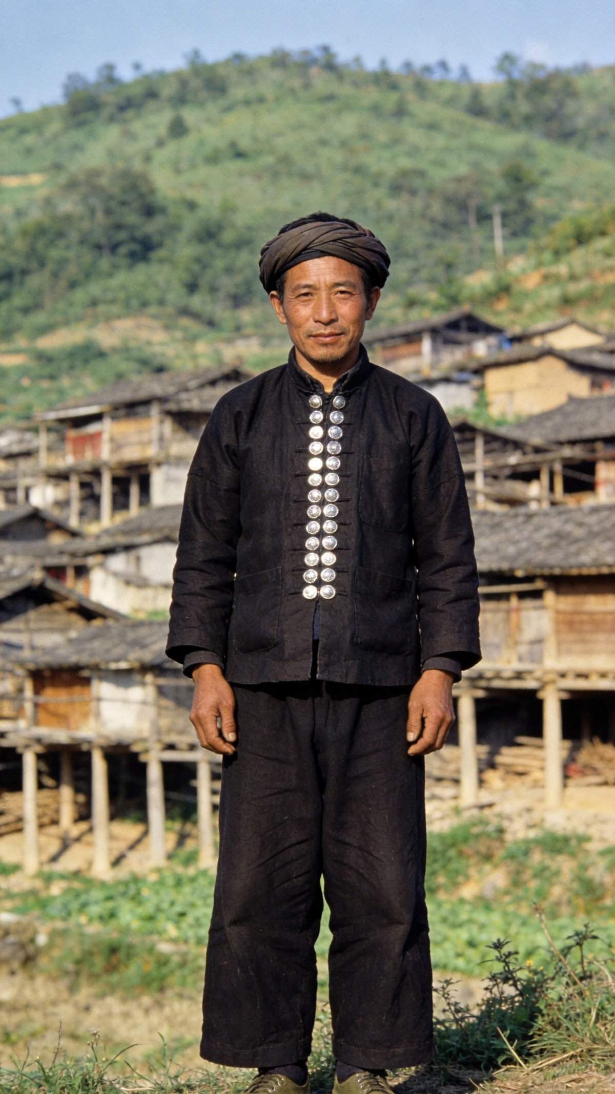 Achang male traditional clothing and headwear