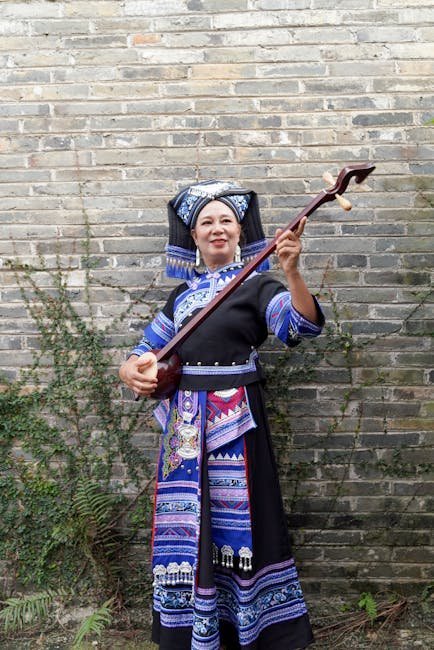 Dong female traditional clothing and silver ornaments
